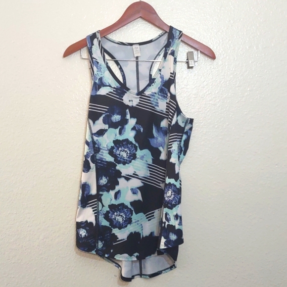 PRE OWNED FILA WORK OUT SHIRT FLOWER PRINT SIZE SMALL 92 % POLYESTER 8% SPANDEX - Picture 1 of 6